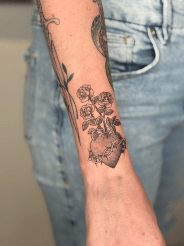 blackwork heart with roses tattoo — by Samantha Wilks, los angeles