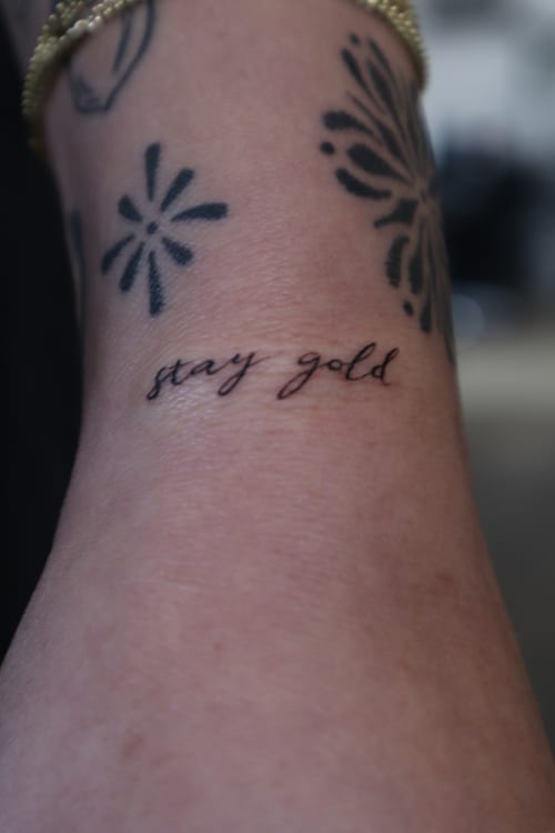 lettering stay gold tattoo — by Vince Espinoza, los angeles