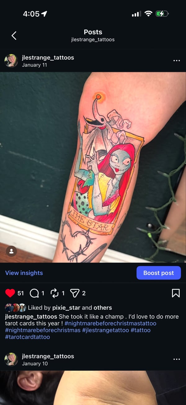 A colorful illustrative tattoo of Sally from 'The Nightmare Before Christmas' depicted as 'The Star' tarot card on the leg, featuring vibrant colors and bold outlines — by Jessica Linden, riverside…
