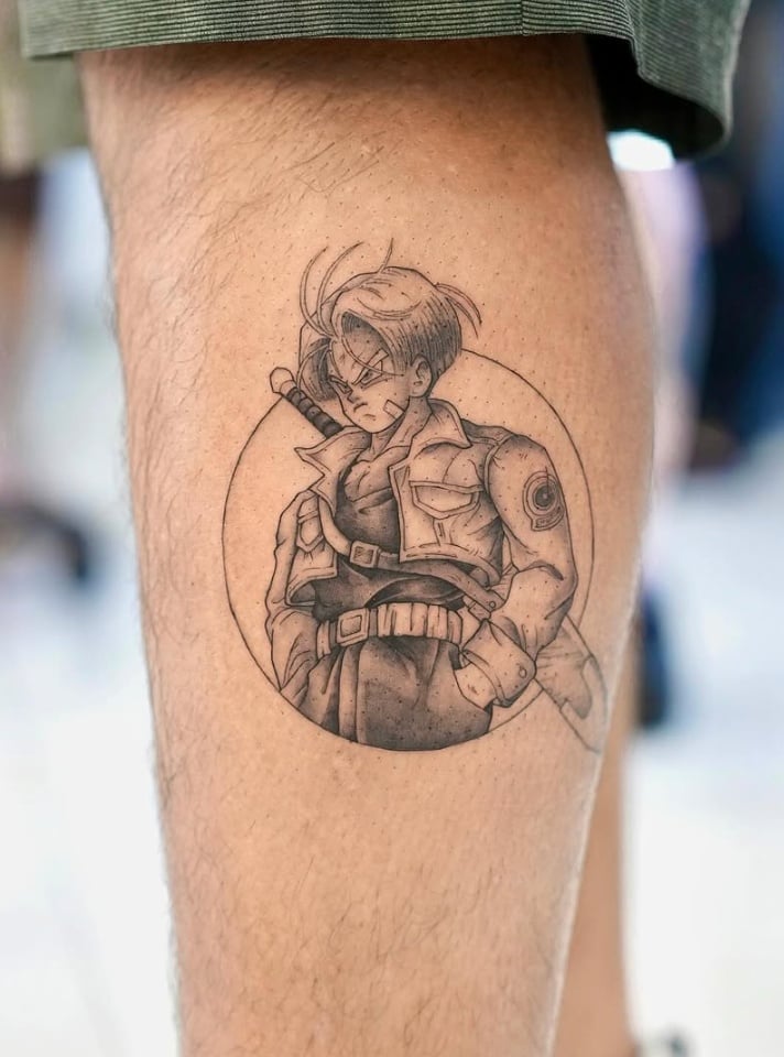 A black and grey anime-style tattoo of Trunks from Dragon Ball, featuring detailed linework and shading, located on the calf — by otaybeatdown, los angeles