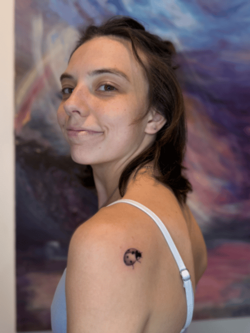 minimalist cat and moon tattoo — by Samantha Wilks, los angeles