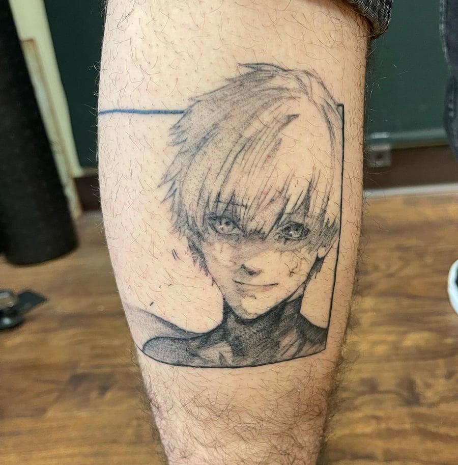 A black and grey anime character portrait tattoo on the calf with a graphic style — by Sandra Price, los angeles