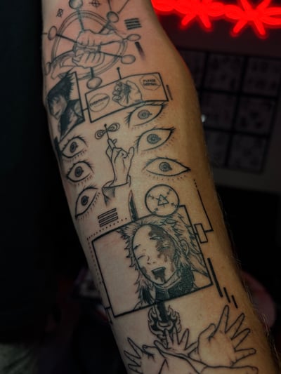 A black and grey linework tattoo on the forearm featuring multiple eyes, hands, and anime-style portraits with intricate details — by Vince Espinoza, los angeles