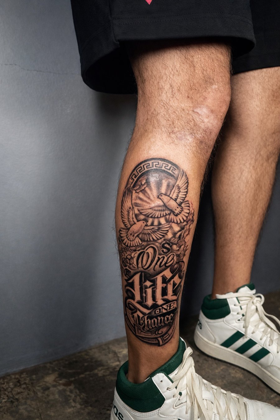 black & grey eagle with lettering tattoo — by Edgar Armas Rodriguez, los angeles