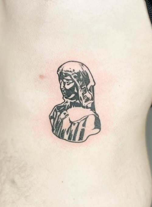 A minimalist blackwork tattoo of a bust portrait on the rib, featuring bold lines and simple shading — by Level tattoo, los angeles