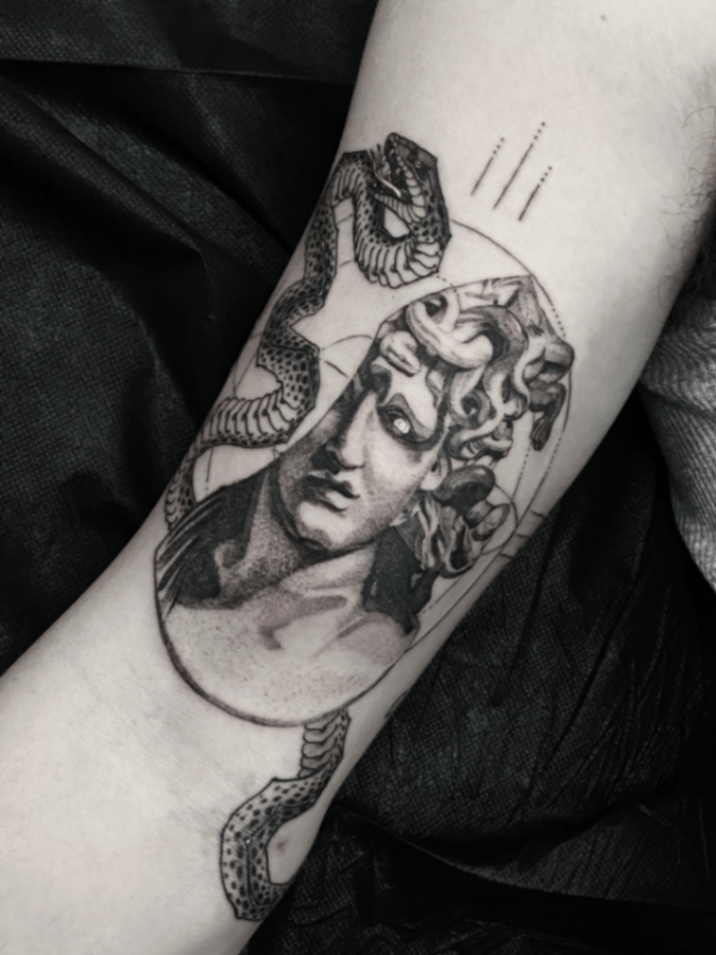 black and grey realism tattoo of Medusa with snakes in her hair by tyler_whitlock, a realism tattoo artist in sherman oaks, los angeles