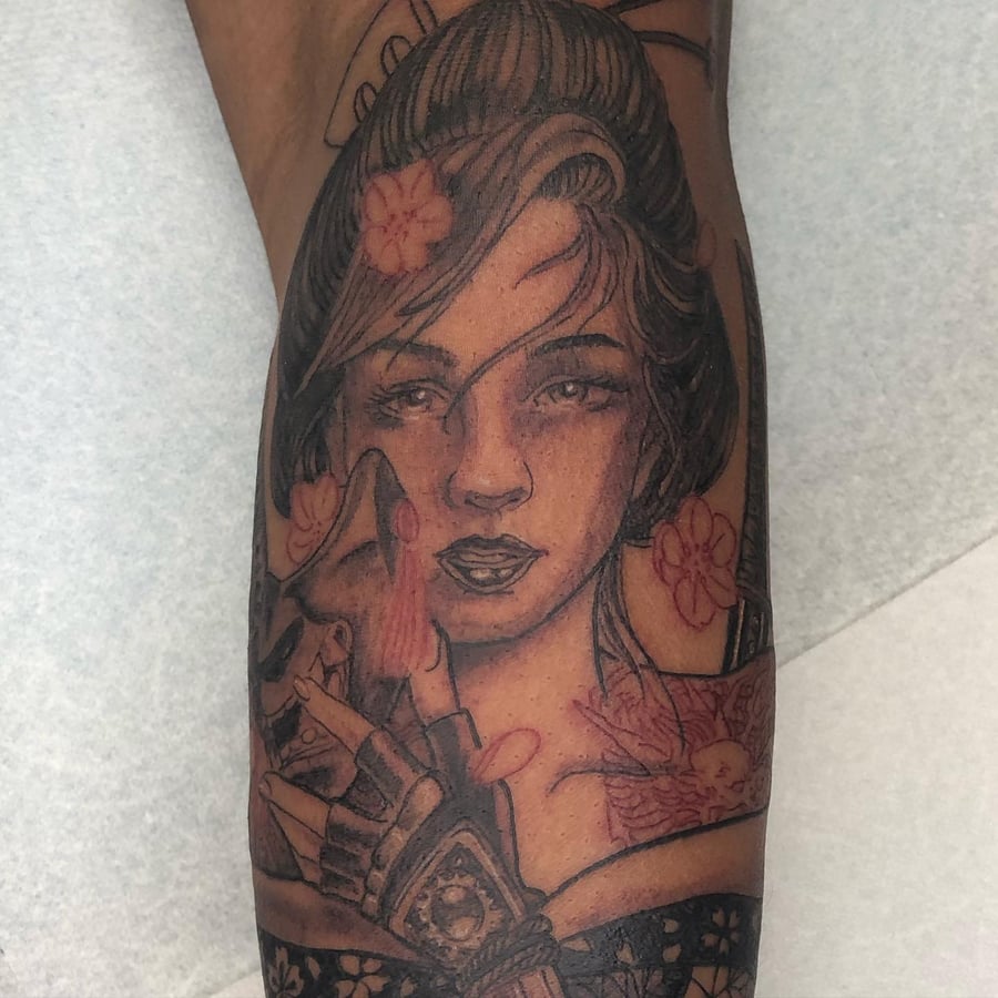 A neo-traditional Japanese style tattoo of a woman's portrait with floral elements on the forearm, featuring delicate and ornate details — by Sandra Price, los angeles