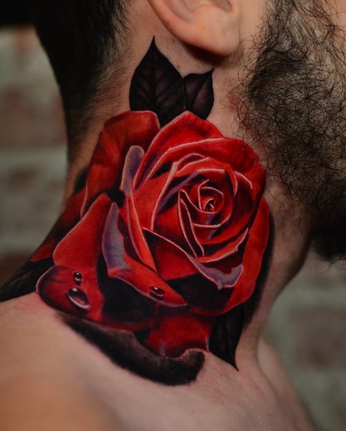 A bold and realistic red rose tattoo on the neck, featuring vibrant colors and detailed shading — by Johnny Ayala, los angeles