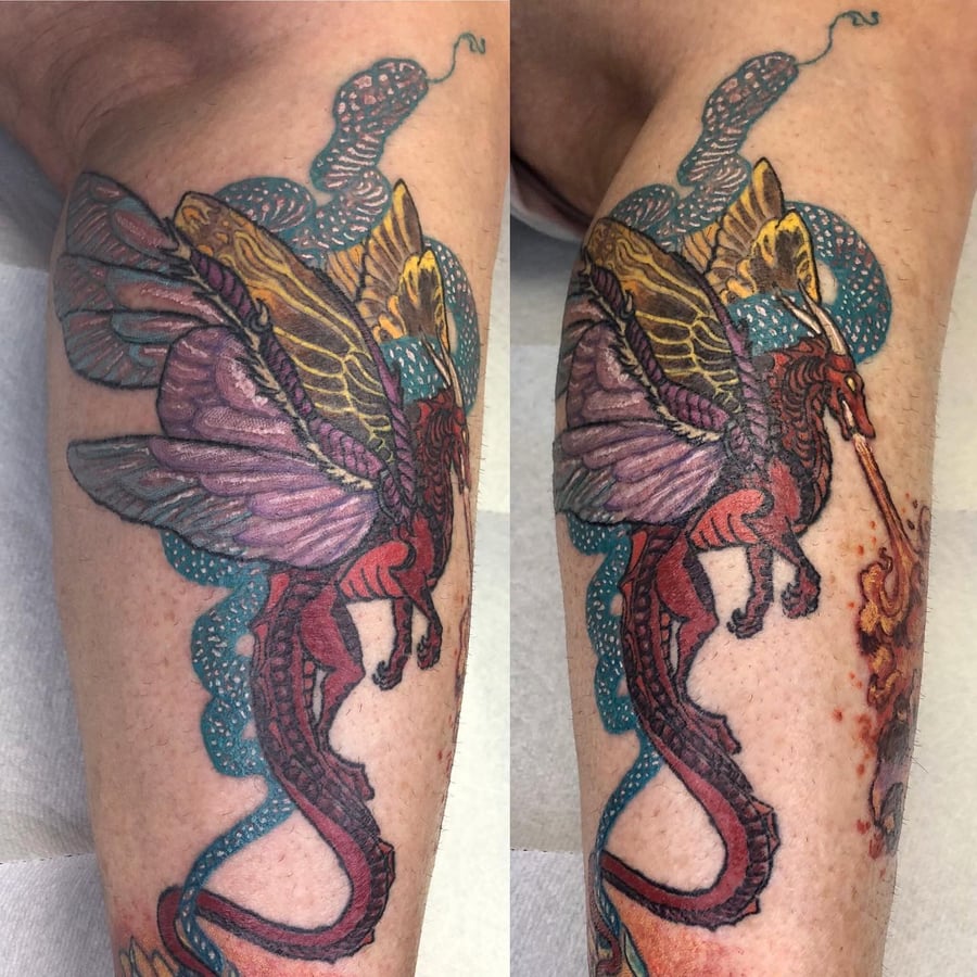 A colorful neo-traditional dragon tattoo on the leg with bold outlines and intricate detailing — by Sandra Price, los angeles