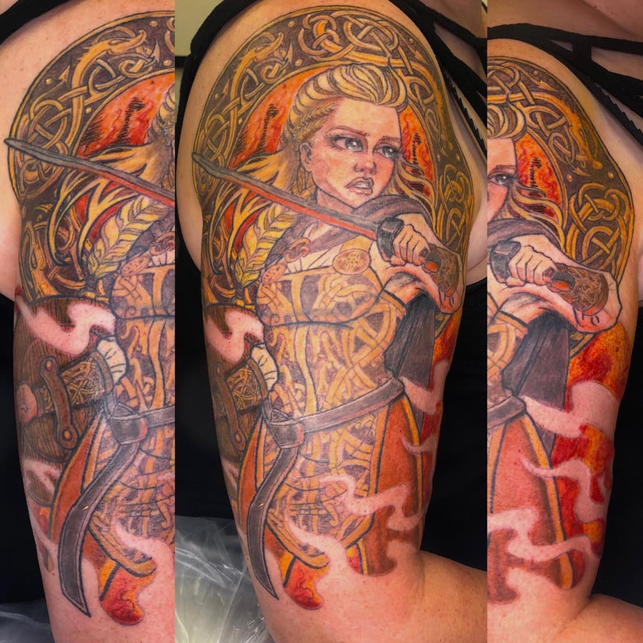 A bold and colorful neo-traditional tattoo of a warrior woman with a sword on the upper arm, featuring Celtic patterns and intricate details — by Sandra Price, los angeles