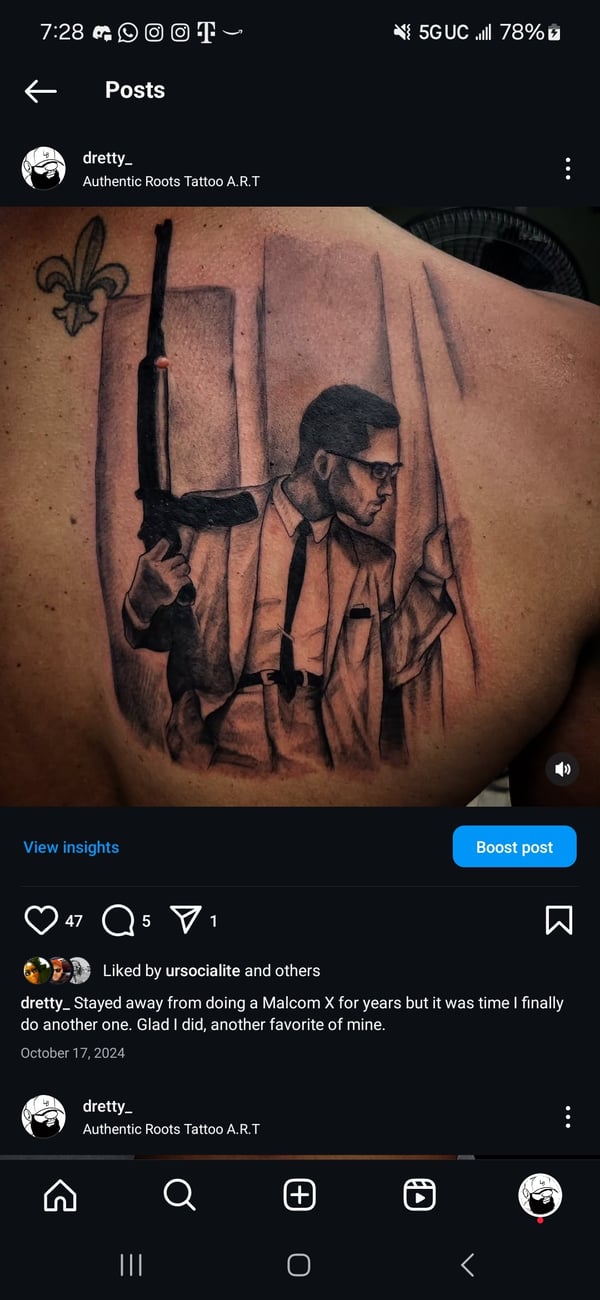 A black and grey realism portrait of Malcolm X on the back, featuring detailed shading and a lifelike depiction — by Dretty, long beach, ca