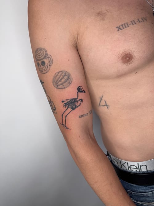 ignorant style ostrich tattoo — by Level tattoo, los angeles