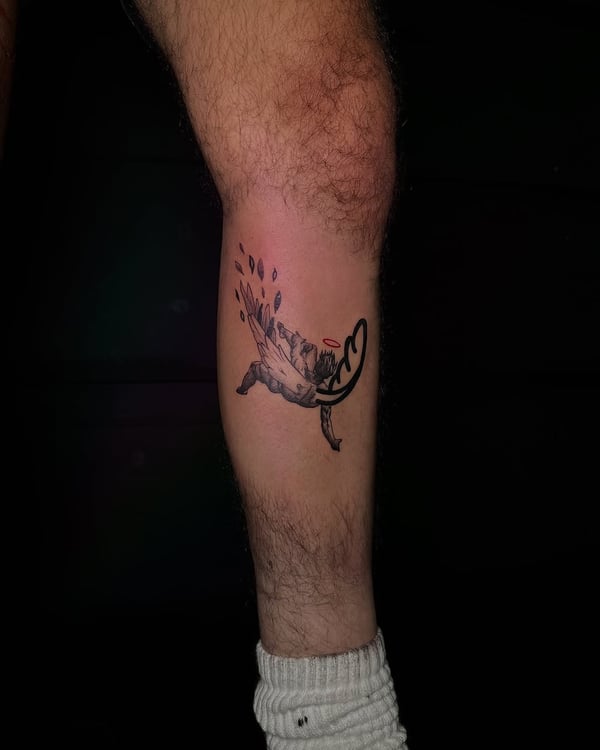 A whimsical black and grey flying pig tattoo on the calf, featuring illustrative and blackwork styles — by zealous, los angeles