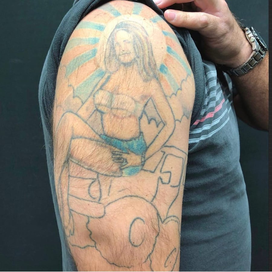 A colorful illustrative tattoo of a woman sitting on a cloud, located on the upper arm — by Sandra Price, los angeles