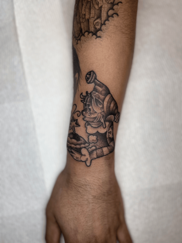 illustrative cartoon character with a hat tattoo — by Engram, tarzana, ca