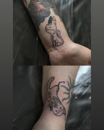 Matching fine line blackwork tattoos of Star Wars characters on the wrist — by Maddie Ramirez, los angeles