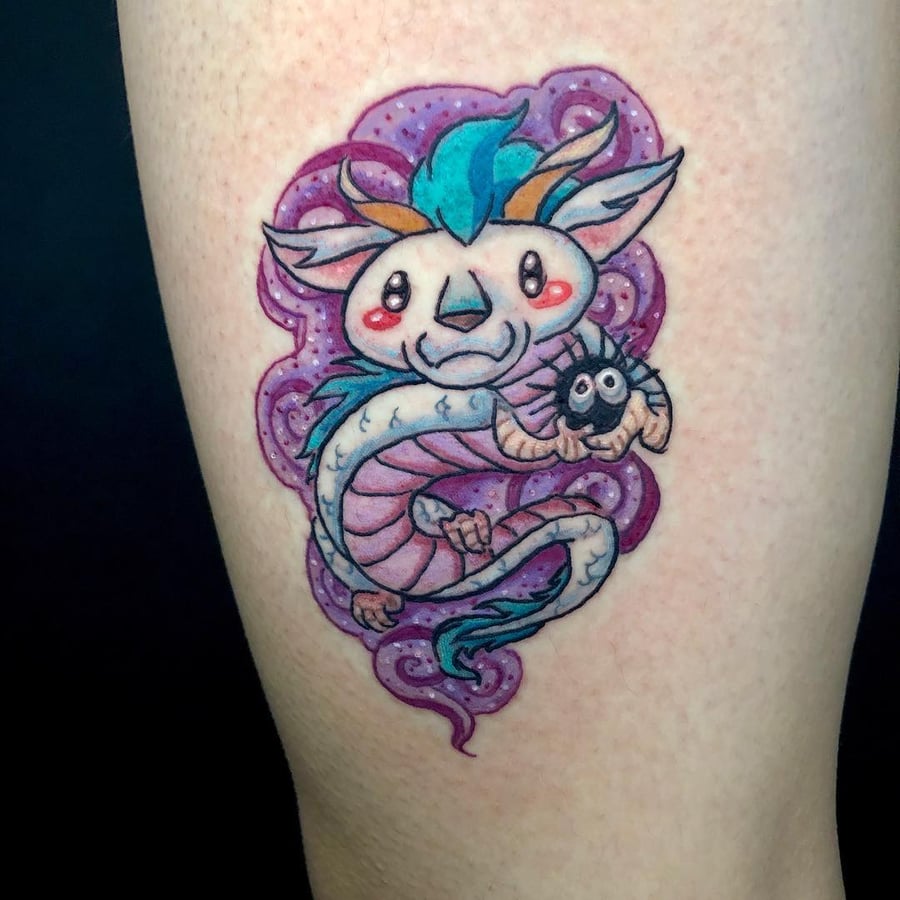 A whimsical and colorful cute dragon tattoo on the leg, featuring a playful design with vibrant colors — by Sandra Price, los angeles