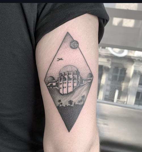 blackwork geometric landscape with building tattoo — by Vince Espinoza, los angeles