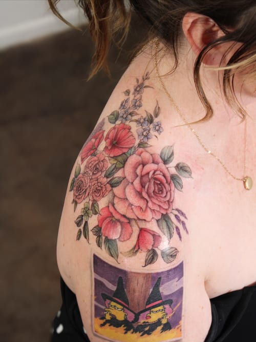 A colorful floral bouquet with roses and cartoon witches on the shoulder, featuring bold and whimsical illustrative style — by Melanie Benoit, los angeles
