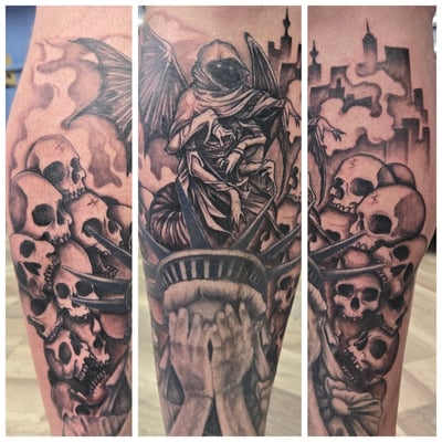 A detailed black and grey tattoo on the calf featuring a hooded figure with wings surrounded by multiple skulls and a cityscape in the background, creating a dark and atmospheric scene — by Dretty,…