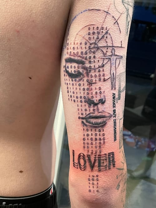 abstract face with text tattoo — by Vince Espinoza, los angeles