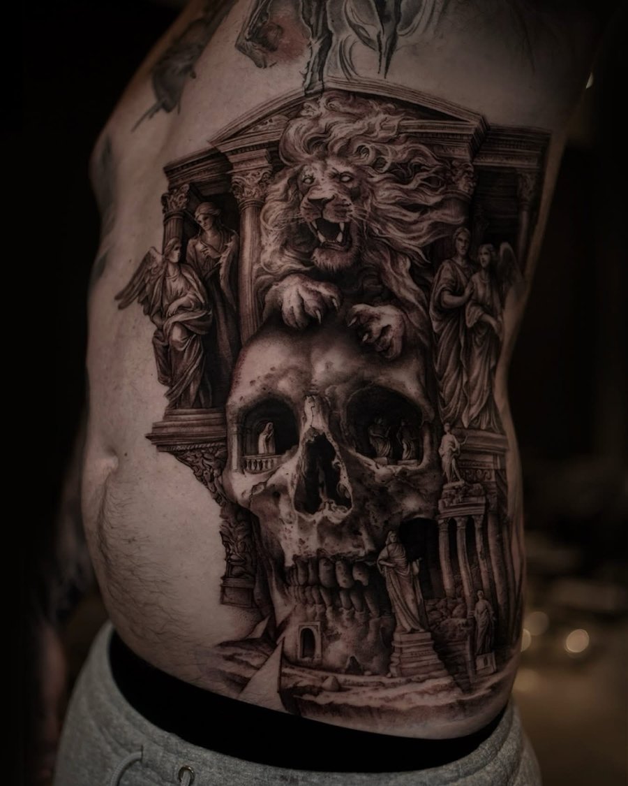 A detailed black and grey tattoo on the rib featuring a lion and skull with intricate architectural elements, showcasing realistic shading and depth — by Vladimir Kozachenko, los angeles