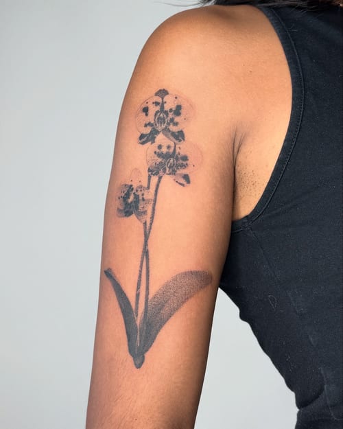 blackwork flower tattoo — by Level tattoo, los angeles