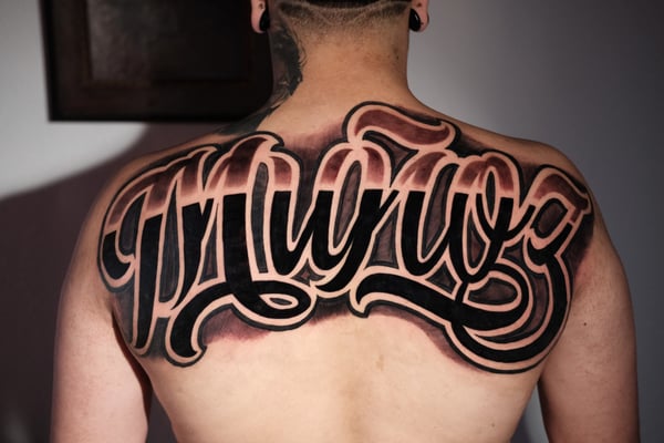 lettering tattoo by Johnny Ayala — los angeles