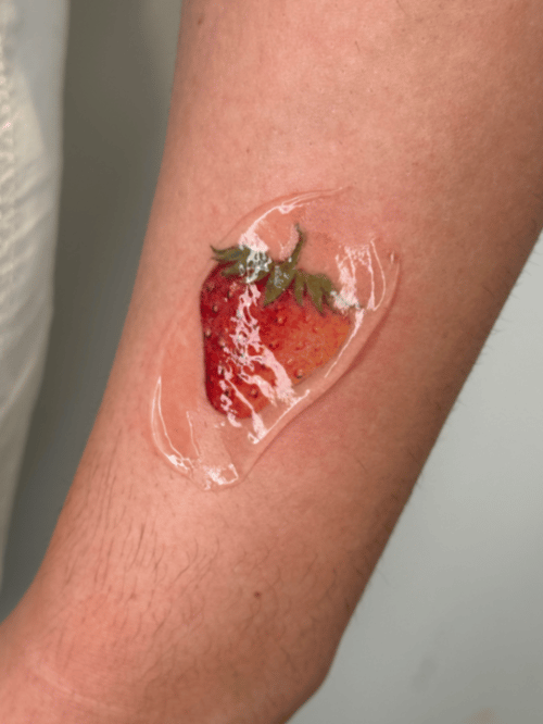realism strawberry tattoo — by Samantha Wilks, los angeles