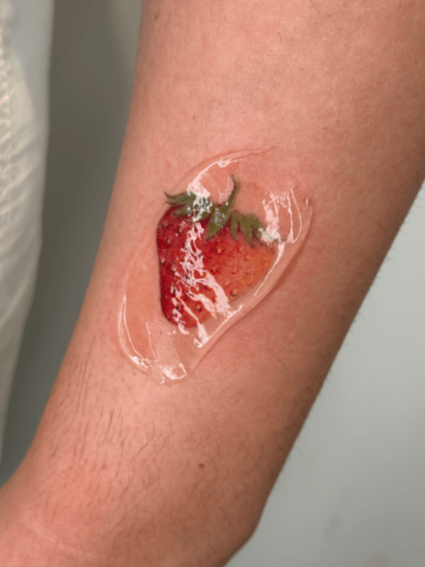 realism strawberry tattoo — by Samantha Wilks, los angeles