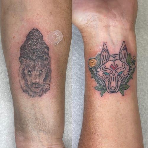 A black and grey lion with an ornate crown tattooed on the forearm in a bold, neo-traditional style — by Sandra Price, los angeles
