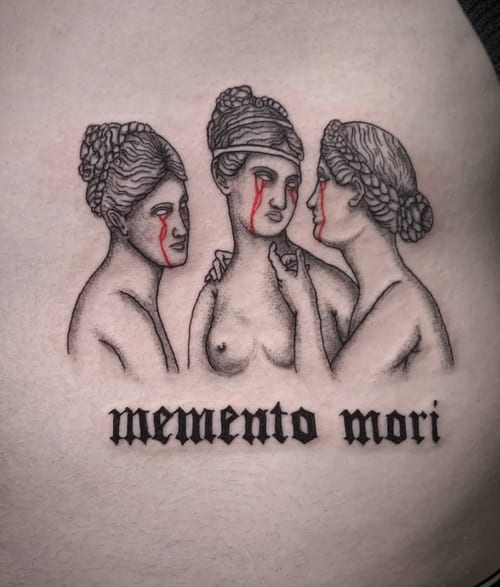 A black and grey tattoo of three women with red tears, accompanied by the phrase 'memento mori' in bold lettering — by Shelby Bianco, los angeles