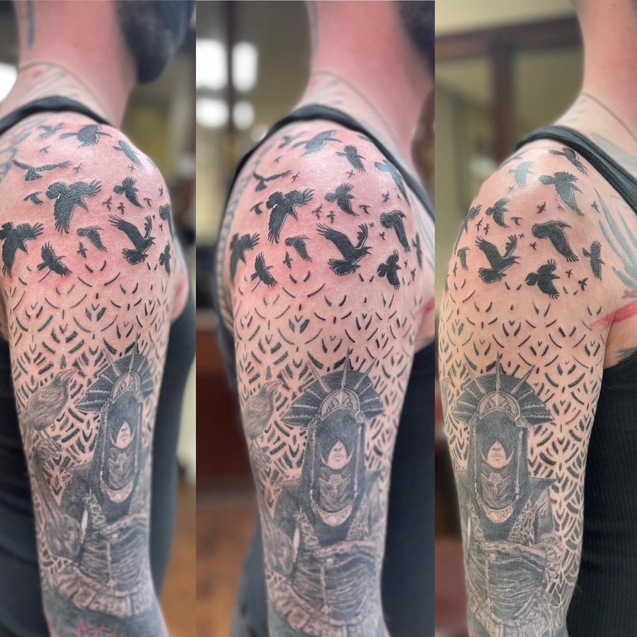 A bold black and grey tattoo of a samurai with birds on the shoulder, featuring Japanese style elements and graphic details — by Sandra Price, los angeles