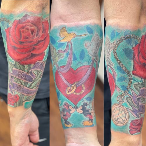 A colorful tattoo on the forearm featuring a rose, heart, and hummingbirds in a bold, illustrative style — by Sandra Price, los angeles