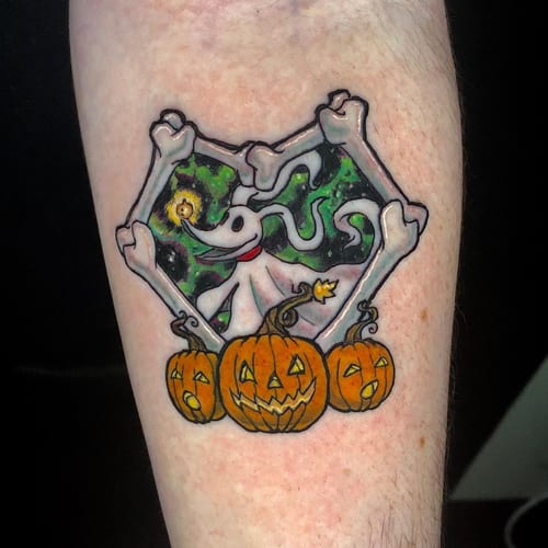 A colorful tattoo of a ghost dog surrounded by pumpkins on the forearm, featuring a whimsical and graphic style — by Sandra Price, los angeles