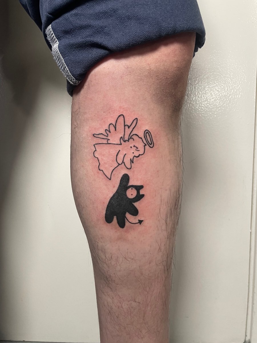 A whimsical black and grey tattoo of simple angel and devil figures on the leg, using minimalist linework — by Brian Kies, los angeles