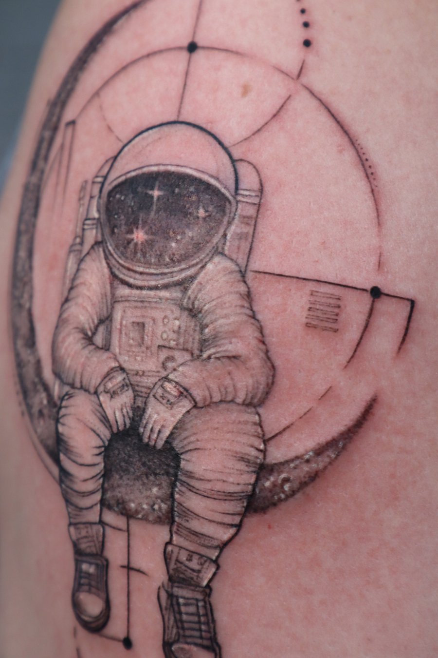 blackwork astronaut sitting on moon tattoo — by Vince Espinoza, los angeles