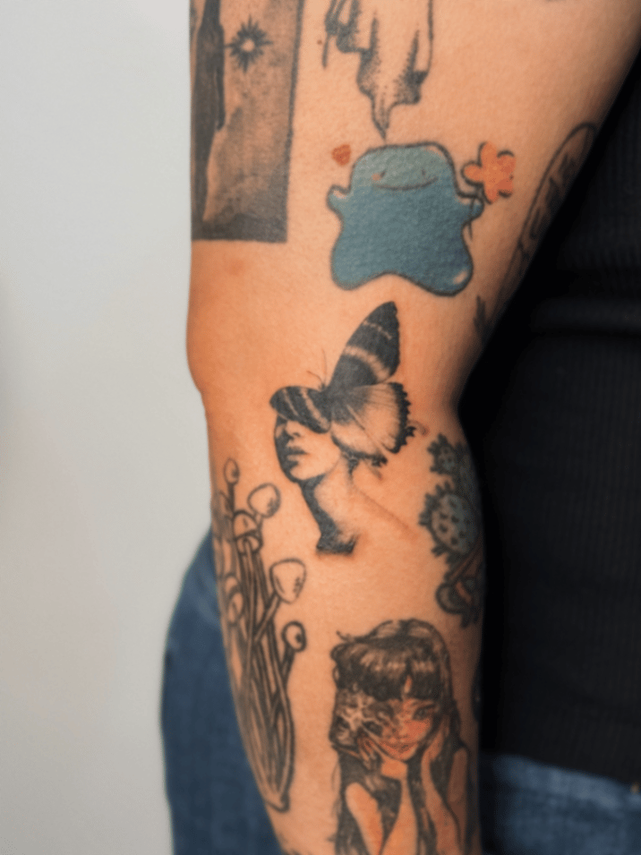 blackwork woman with butterfly tattoo — by lunayflorestattoo, los angeles