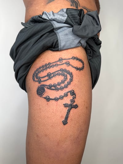 black & grey rosary beads with cross tattoo — by Level tattoo, los angeles