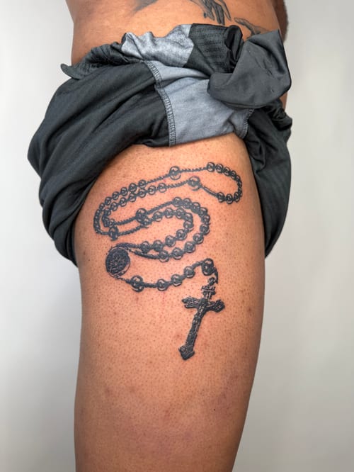 black & grey rosary beads with cross tattoo — by Level tattoo, los angeles