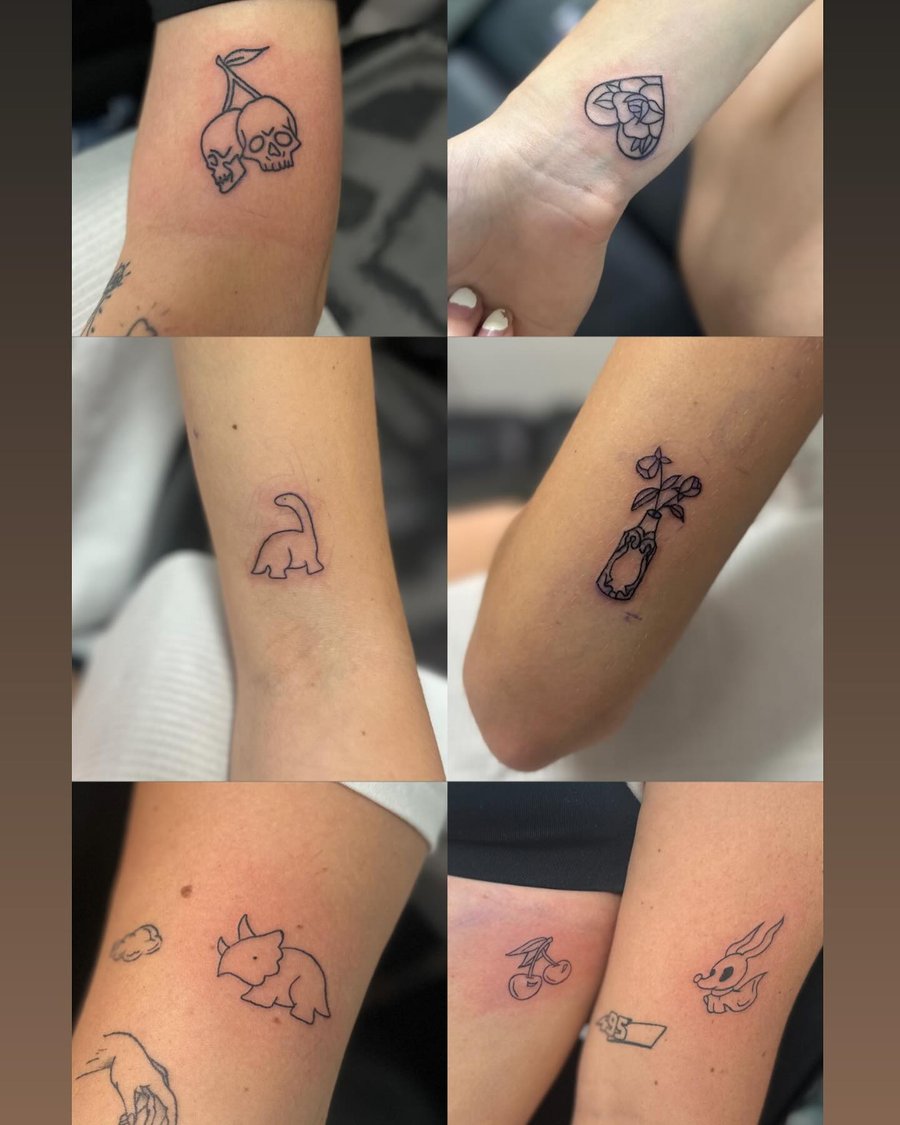 Various small blackwork tattoos including skulls, a heart, and a dinosaur — by Maddie Ramirez, los angeles