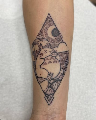 A whimsical black and grey tattoo of an anime character holding an umbrella on the forearm, featuring linework and a moon in the background — by Sandra Price, los angeles