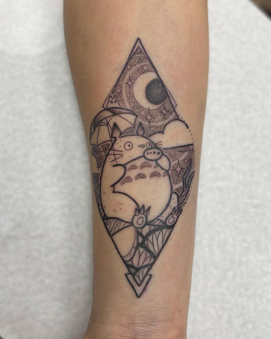 A whimsical black and grey tattoo of an anime character holding an umbrella on the forearm, featuring linework and a moon in the background — by Sandra Price, los angeles