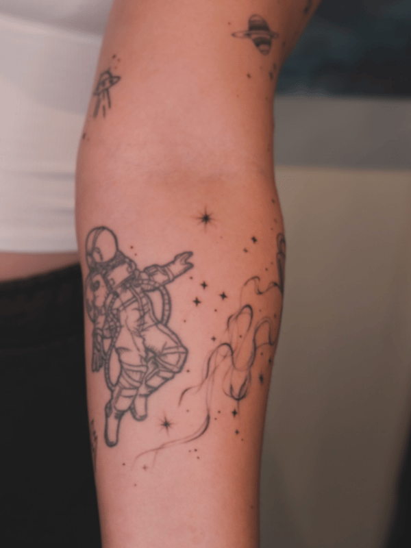 linework astronaut tattoo — by Samantha Wilks, los angeles