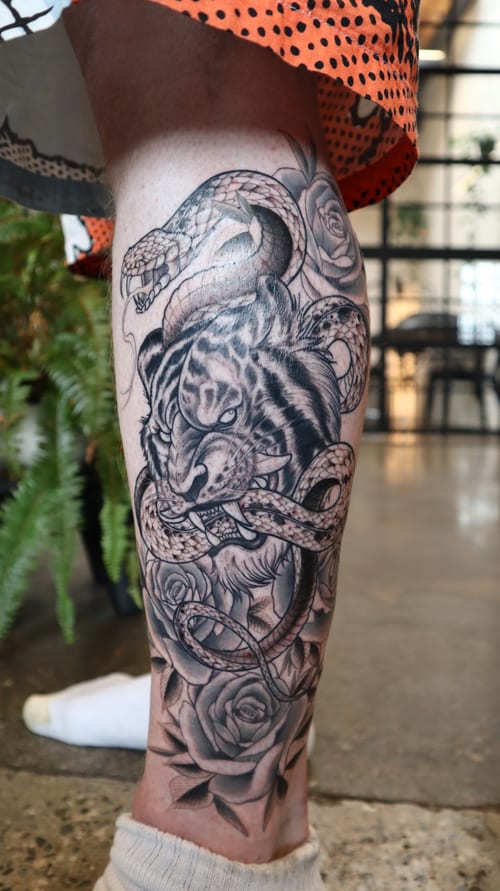 black & grey snake and tiger tattoo — by Vince Espinoza, los angeles