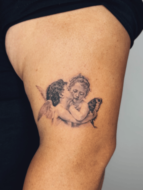 realism cherubs tattoo — by lunayflorestattoo, los angeles
