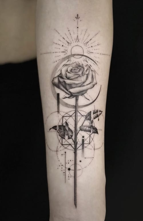 A black and grey geometric tattoo of a rose with fine lines and sacred geometry elements on the forearm — by Jian Liang, los angeles