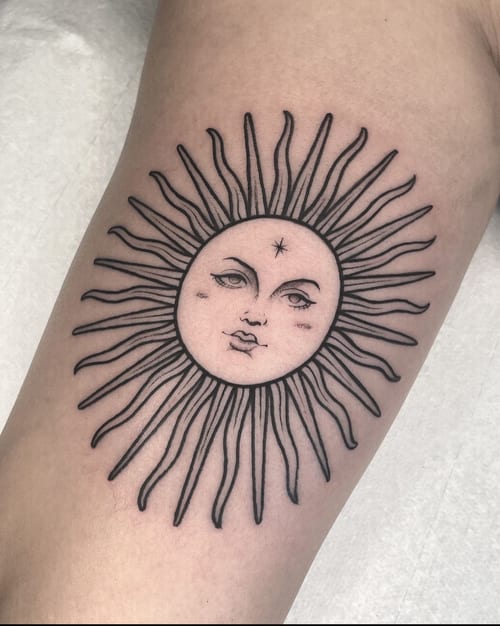 linework sun with face tattoo — by Vince Espinoza, los angeles