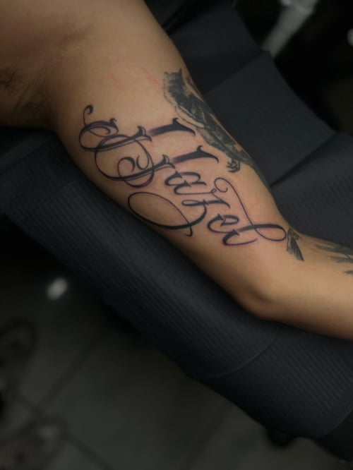 lettering tattoo by mr. folks in los angeles
