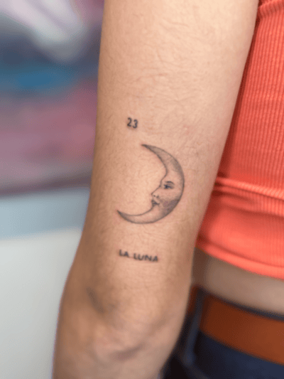 minimalist crescent moon with face tattoo — by Samantha Wilks, los angeles